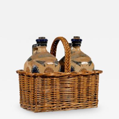 Two Victorian English Pottery Decanters in Tantalus Inspired Wicker Basket