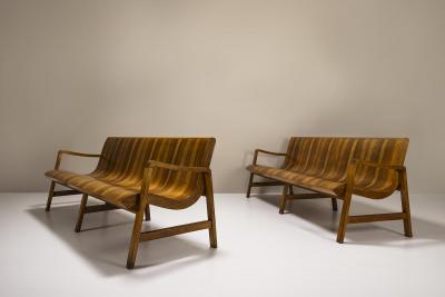 Two Wave Shaped Benches in Walnut with Two tone Veneering Italy 1950s