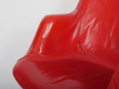 Two Yrjo Kukkapur red leather Junior chairs by Hami Finland c1960 
