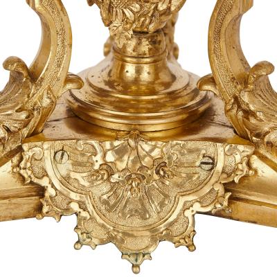 Two antique French gilt bronze four light girandoles