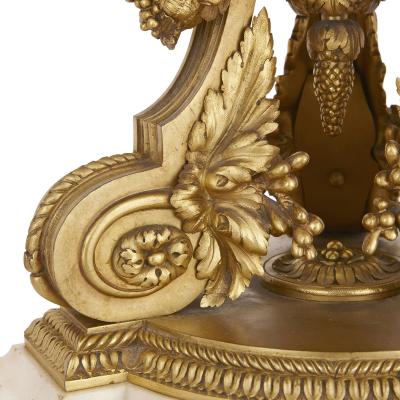 Two antique Louis XV style gilt bronze and marble table lamps