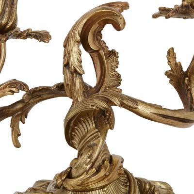 Two antique Rococo style ormolu candelabra