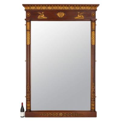 Two large English neoclassical carved wood mirrors