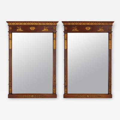 Two large English neoclassical carved wood mirrors