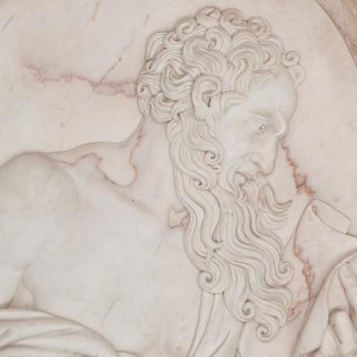 Two large sculpted marble relief plaques of St John and St James