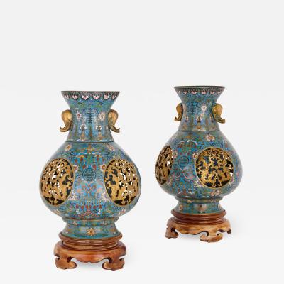 Two late Qing Dynasty cloisonn enamel and gilt bronze vases