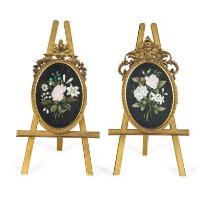 Two very similar pietra dura and ormolu photograph frames on easels