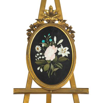 Two very similar pietra dura and ormolu photograph frames on easels