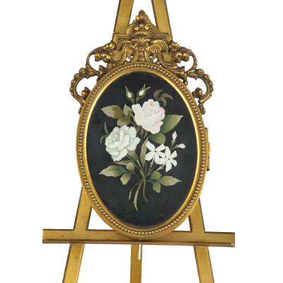 Two very similar pietra dura and ormolu photograph frames on easels