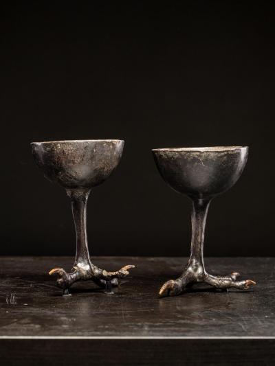 Two wooden witchcups mounted on birdlegs