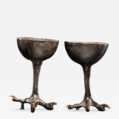 Two wooden witchcups mounted on birdlegs