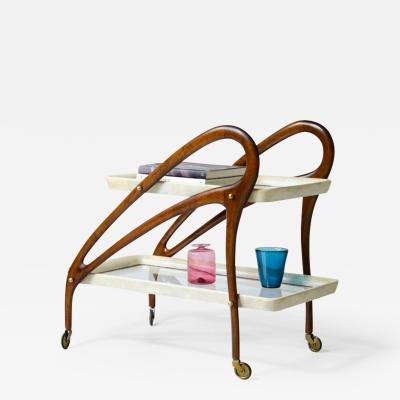 Unique bentwood service trolley with two glass and parchment shelves