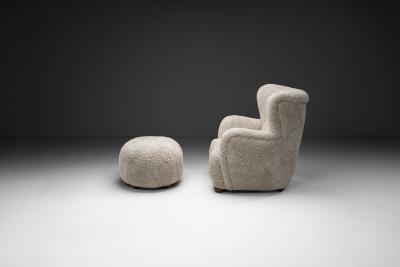 Upholstered Danish Modern Armchair with Footstool Denmark ca 1950s