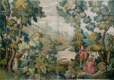 VERDURE WITH FIGURES IN A WOODED LANDSCAPE