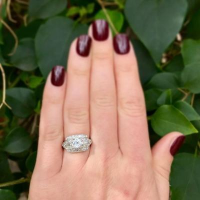 VINTAGE 1950S 0 46 CARAT DIAMOND CENTER AND PLATINUM ENGAGEMENT RING