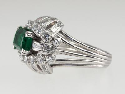 VINTAGE 1950S EMERALD AND DIAMOND BOMBE PLATINUM COCKTAIL RING