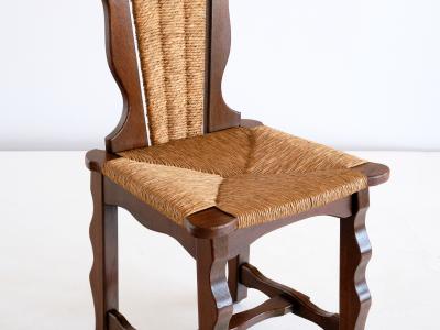 Victor Courtray Set of Six Victor Courtray Attributed Dining Chairs in Oak and Rush 1950s