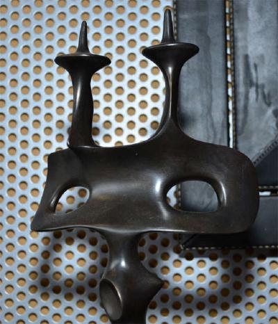 Victor Roman Pair of candelsticks in patinated bronze by Victor Roman