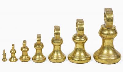 Victorian Set Seven Brass Bell Form Weights