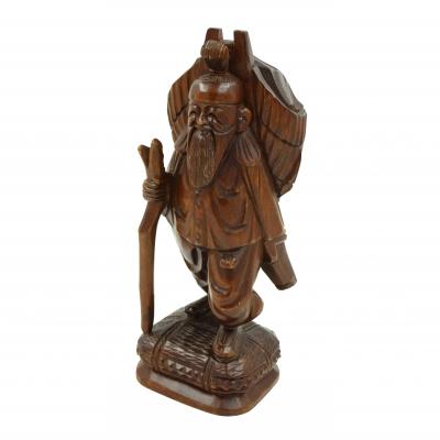 Vintage Asian Carved Figure of a Man with Pack and Walking Stick
