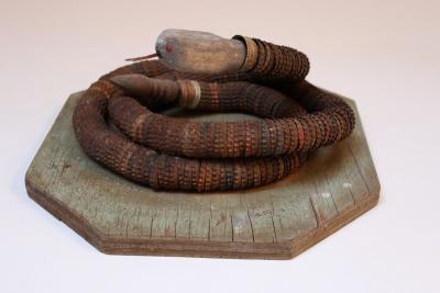 Vintage Folk Art Hand Carved Wood and Bottlecap Snake on Octagonal Base