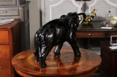 Vintage Italian Black Glazed Ceramic Sculpture of a Walking Elephant Trunk Up