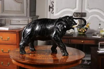 Vintage Italian Black Glazed Ceramic Sculpture of a Walking Elephant Trunk Up