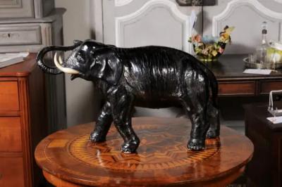 Vintage Italian Black Glazed Ceramic Sculpture of a Walking Elephant Trunk Up