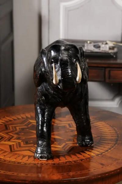 Vintage Italian Black Glazed Ceramic Sculpture of a Walking Elephant Trunk Up