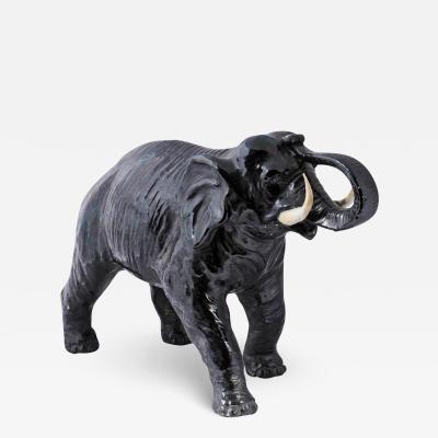 Vintage Italian Black Glazed Ceramic Sculpture of a Walking Elephant Trunk Up