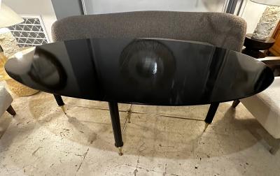 Vintage Italian Oval Ebonized Dining Table resting on a Bronze Base