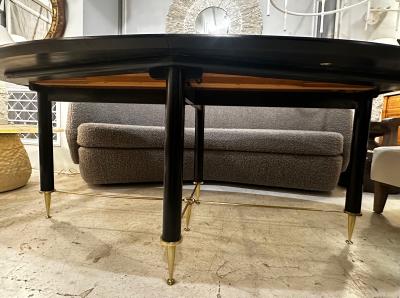 Vintage Italian Oval Ebonized Dining Table resting on a Bronze Base