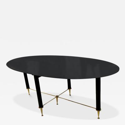 Vintage Italian Oval Ebonized Dining Table resting on a Bronze Base