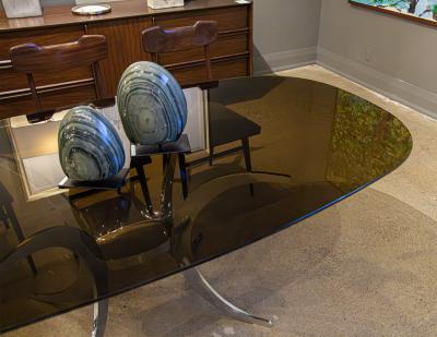 Vintage Modern Dining Table with Sculpted Metal Base Table and Smoked Glass Top