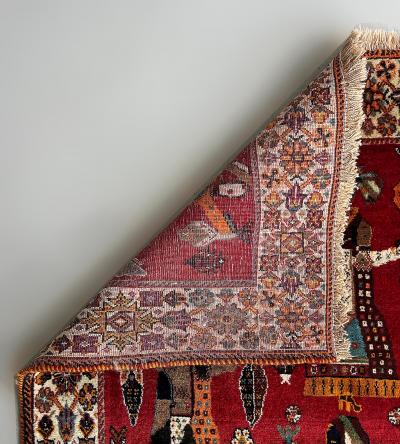 Vintage Persian Rug Depicting Stylized Tribal Dancers on Red 72 by 45 