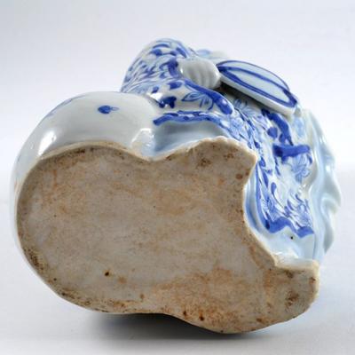 Vintage Porcelain Buddha Holding a Fan