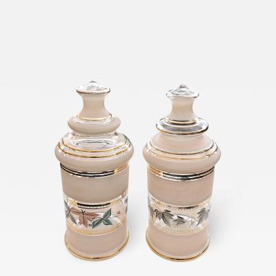 Vintage pair of pale pink frosted glass apothecary jars with foliate decoration