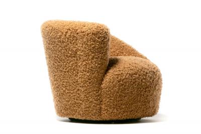 Vladimir Kagan Pair of Vladimir Kagan Nautilus Swivel Lounge Chairs and Ottoman in Curly Camel