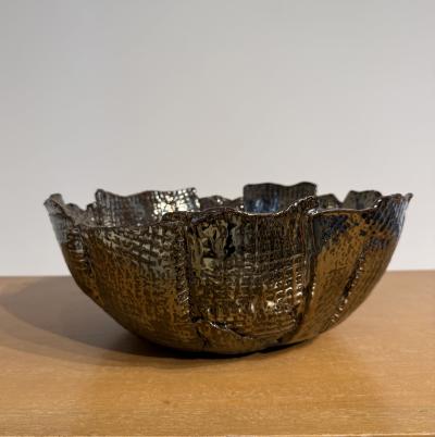 Waffle textured bowl in a black chrome metallic glaze Made By Aram C 