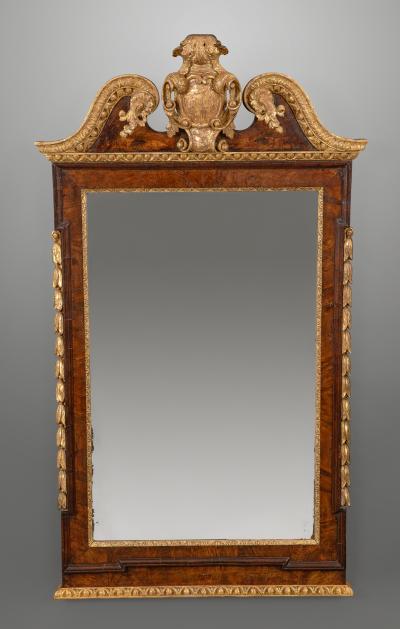 Walnut and parcel gilt mirror circa 1730