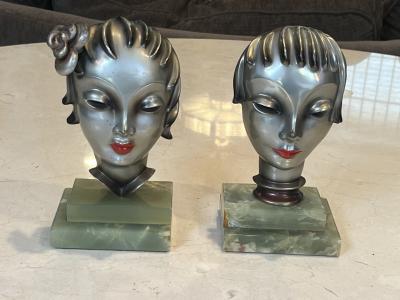 Walter Bosse ART DECO POLYCHROMED BRONZE STYLIZED FEMALE FACE BOOKENDS BY WALTER BOSSE