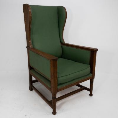 Walter Skull High Wycombe An Arts Crafts Oak Wing Back Upholstered Armchair