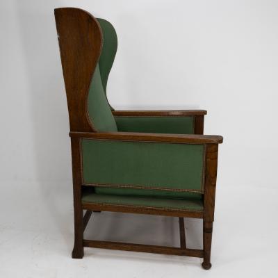 Walter Skull High Wycombe An Arts Crafts Oak Wing Back Upholstered Armchair