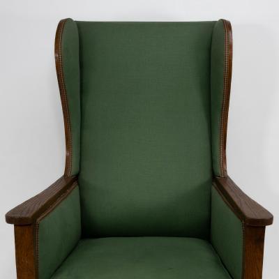 Walter Skull High Wycombe An Arts Crafts Oak Wing Back Upholstered Armchair