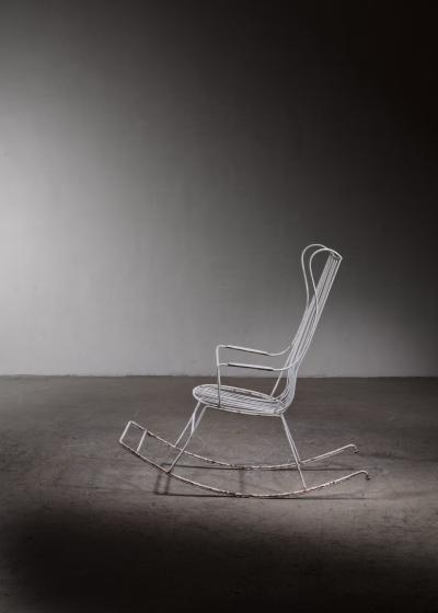 White lacquered wrought iron rocking chair
