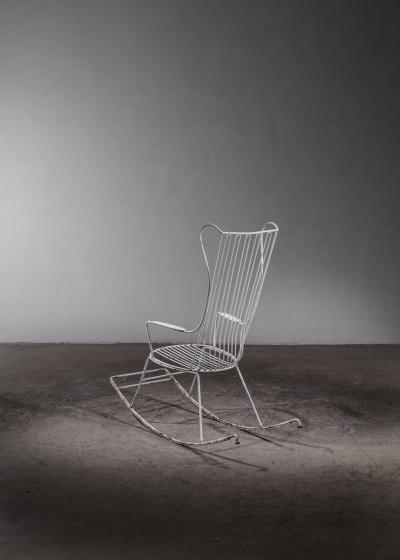 White lacquered wrought iron rocking chair