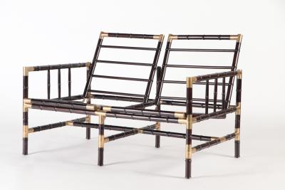 William Billy Haines A brass mounted faux bamboo adjustable settee In the manner of Billy Haines