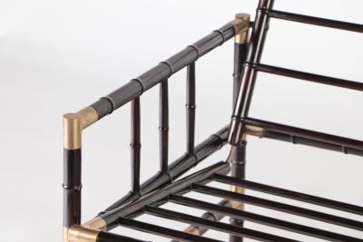 William Billy Haines A brass mounted faux bamboo adjustable settee In the manner of Billy Haines