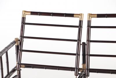 William Billy Haines A brass mounted faux bamboo adjustable settee In the manner of Billy Haines