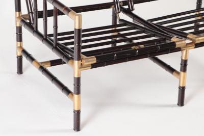 William Billy Haines A brass mounted faux bamboo adjustable settee In the manner of Billy Haines